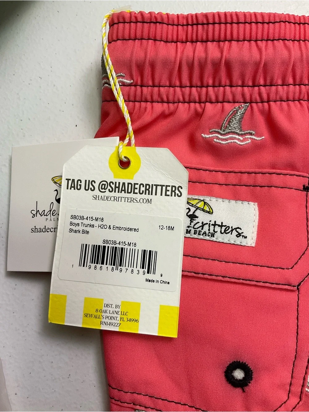 Shark Bite Boys 4 Way Stretch Water Appearing Embroidered Swim Trunks - Coral